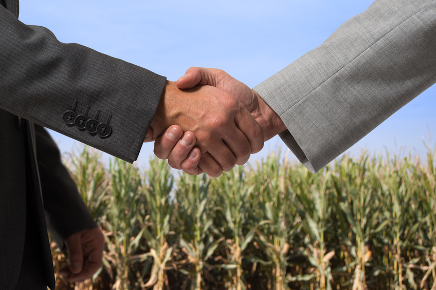 shaking hands farm